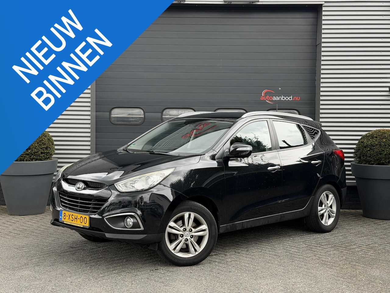 Hyundai ix35 - 2.0i 4WD i-Catcher | Camera | Navigatie | Climate Control | Trekhaak | - AutoWereld.nl