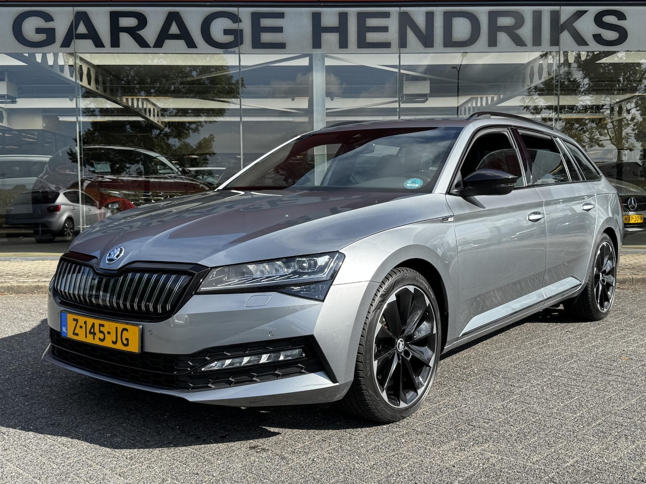 Skoda Superb Combi - 1.4 TSI iV PHEV Sportline Business | SOH: 91,6% | Matrix Led | All season | Camera | NIEUW - AutoWereld.nl