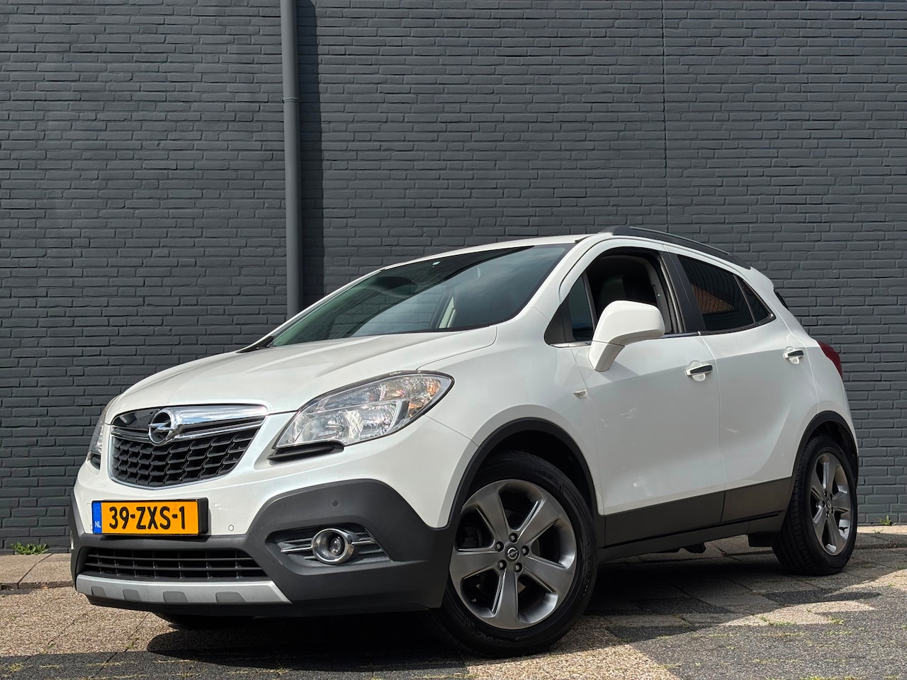 Opel Mokka - 1.6 Cosmo | Schuifdak | Camera | Stoelverwarming - AutoWereld.nl