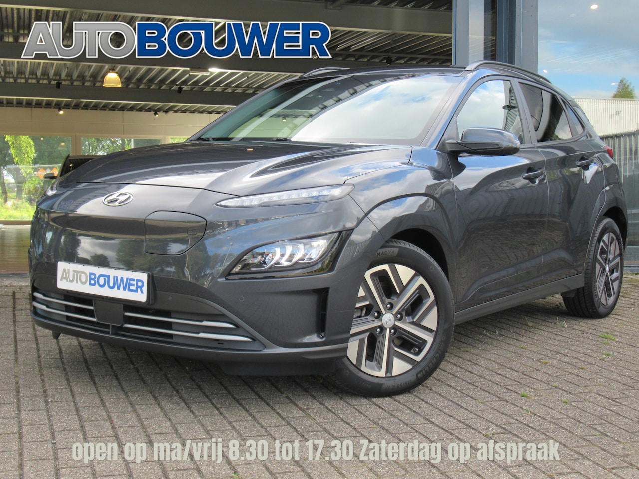 Hyundai Kona Electric - EV Premium 64 kWh | 3 fase | Warmtepomp 1e eigen | dealer onderh | adp.cruise | navi | key - AutoWereld.nl