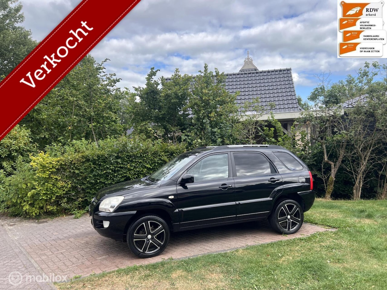 Kia Sportage - 2.0 CVVT X-ecutive 2.0 CVVT X-ecutive - AutoWereld.nl