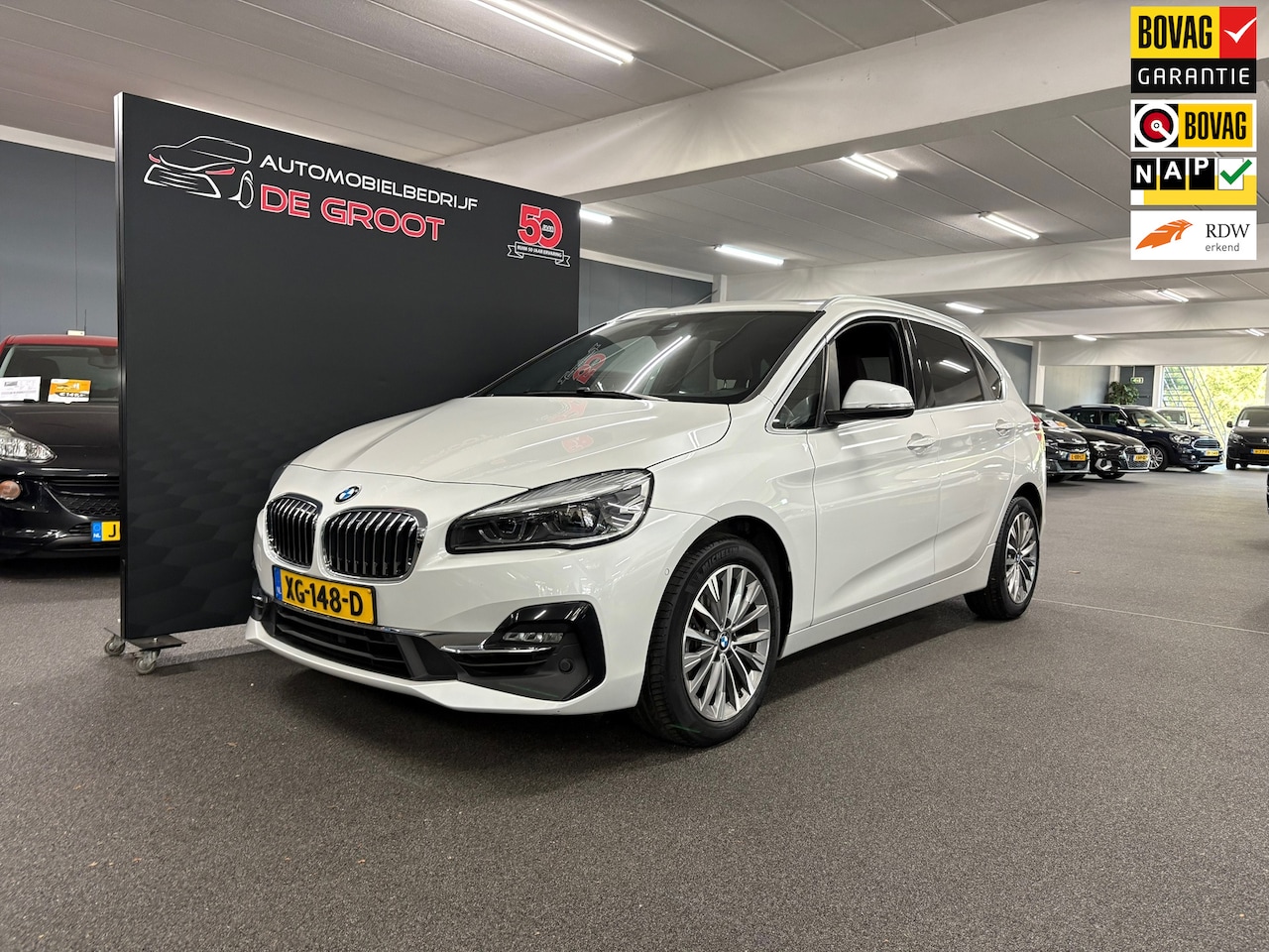 BMW 2-serie Active Tourer - 218i High Executive/ NL auto/ Afneembare trekhaak/ Achteruitrijcamera - AutoWereld.nl