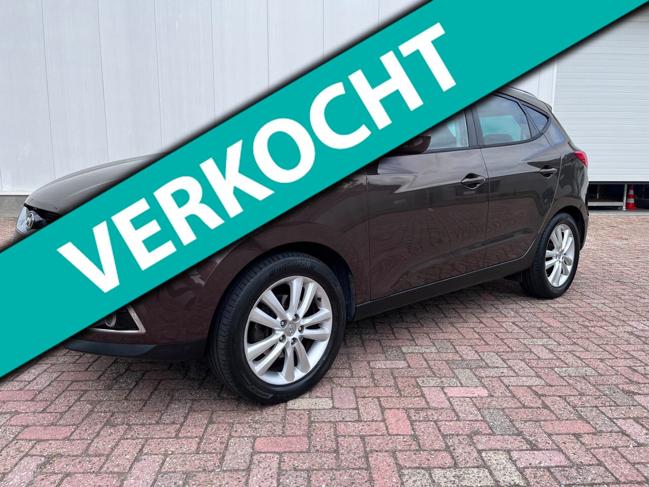 Hyundai ix35 - 2.0i i-Catcher automaat Panorama dak camera navigatie winterpakket 2012 - AutoWereld.nl