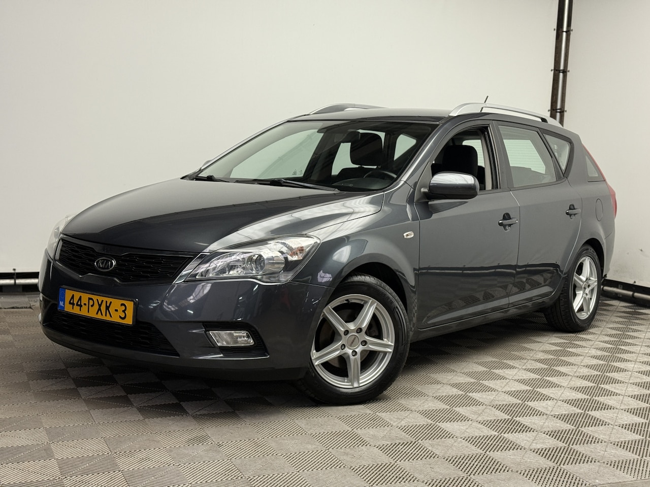 Kia Cee'd - 1.4 CVVT X-ecutive Navi ECC Trekhaak NL Auto - AutoWereld.nl