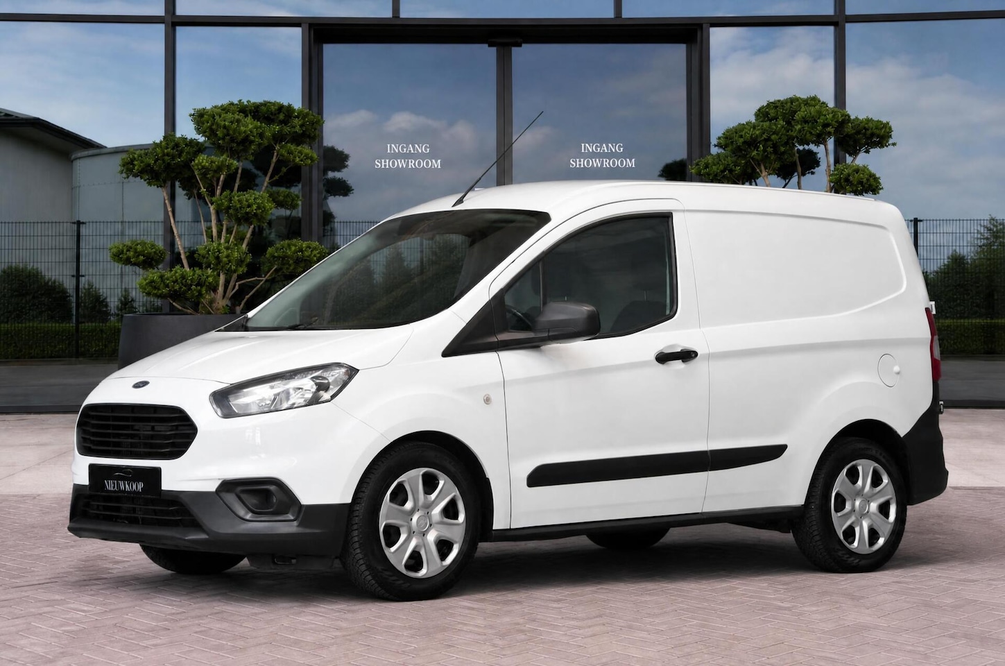 Ford Transit Courier - 1.0 Ambiente AIRCO | CRUISE | MARGE - AutoWereld.nl