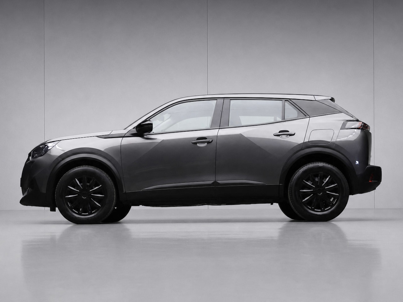 Peugeot 2008 - 1.2 PureTech 100 Sport (APPLE CARPLAY,NAVI,CAMERA,STOELVERWARMING,CLIMATE,CRUISE,LED,SPORT - AutoWereld.nl