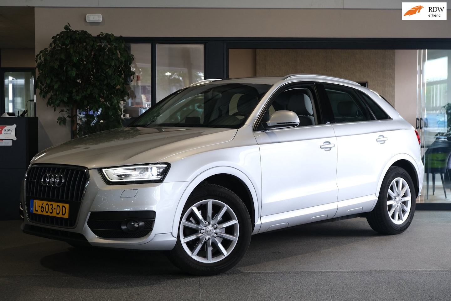 Audi Q3 - 2.0 TFSI quattro 170PK Xenon Cruise PDC Trehaak - AutoWereld.nl