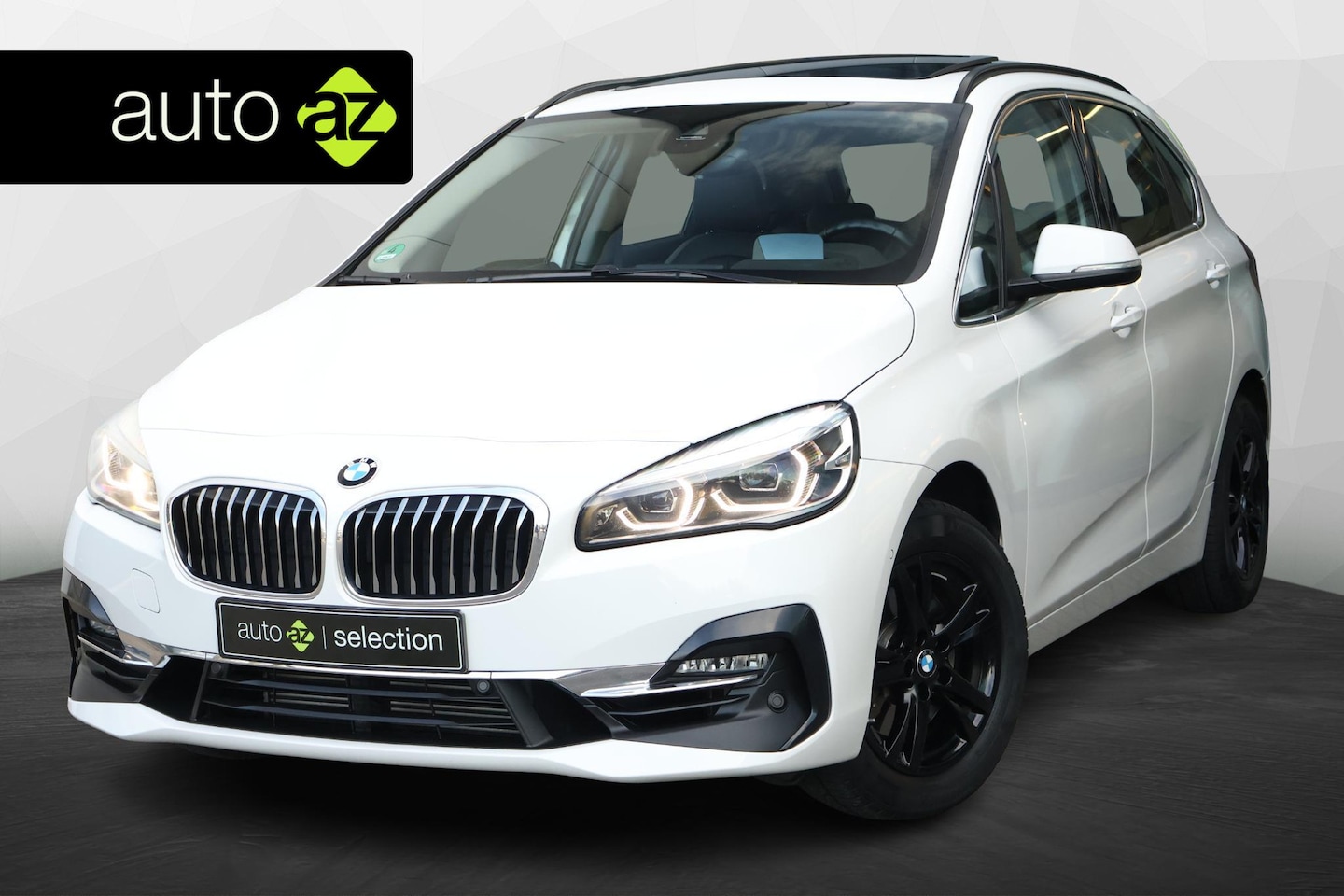 BMW 2-serie Active Tourer - 220i High Executive / Pano / Cruise / Head-up - AutoWereld.nl