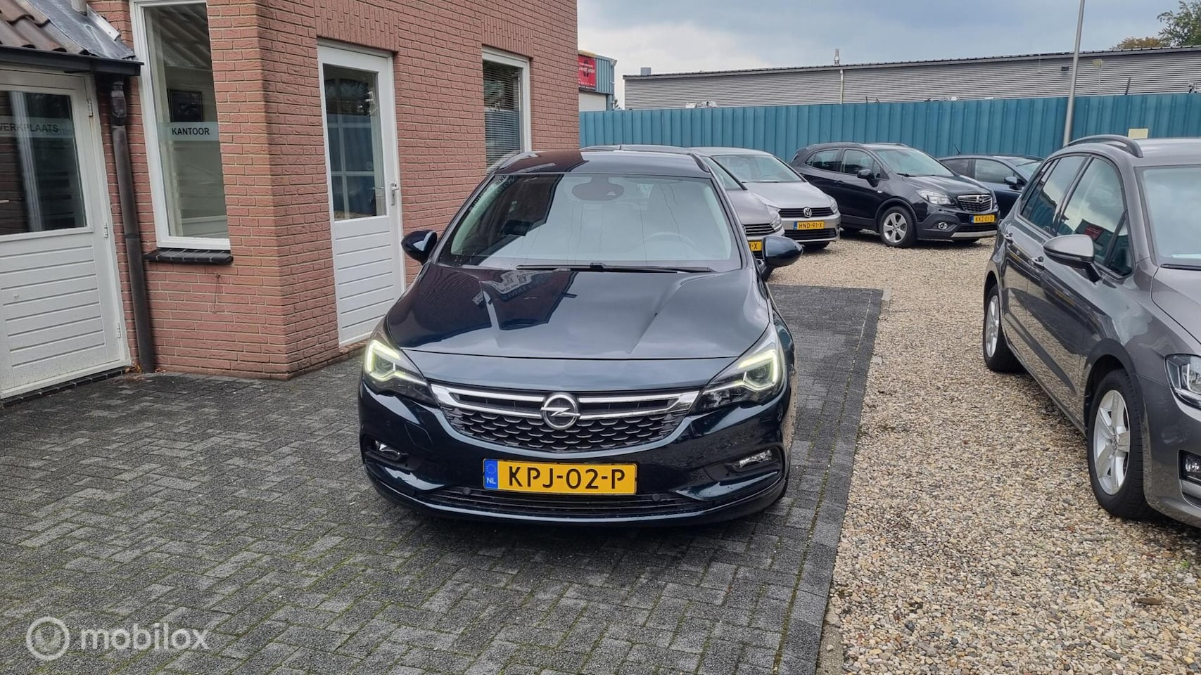Opel Astra Sports Tourer - 1.4 Turbo 120 Jaar Edition 1.4 Turbo 120 Jaar Edition" - AutoWereld.nl