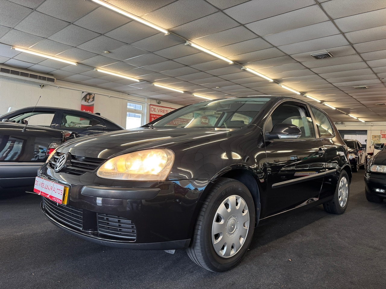 Volkswagen Golf - 1.6 Turijn. Cruise control, airco, touchscreen en meer! - AutoWereld.nl