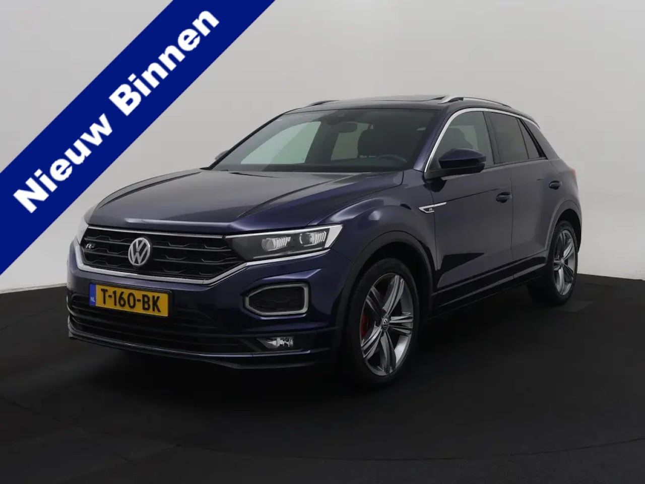Volkswagen T-Roc - 2.0 TSI 4Motion Sport Business R Pano | LED | VC | Stoelverw. | ACC | ECC 01-2019 67.366 - AutoWereld.nl