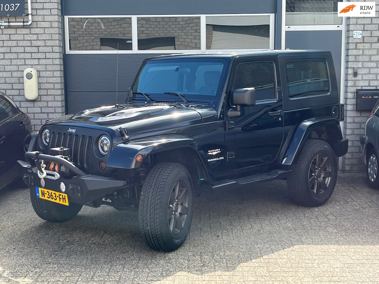 Jeep Wrangler - 3.8 Sport airco Cabriolet 4x4 lier - AutoWereld.nl