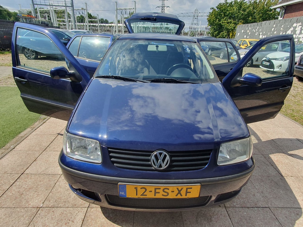 Volkswagen Polo - 1.4 Comfortline 1.4 Comfortline - AutoWereld.nl