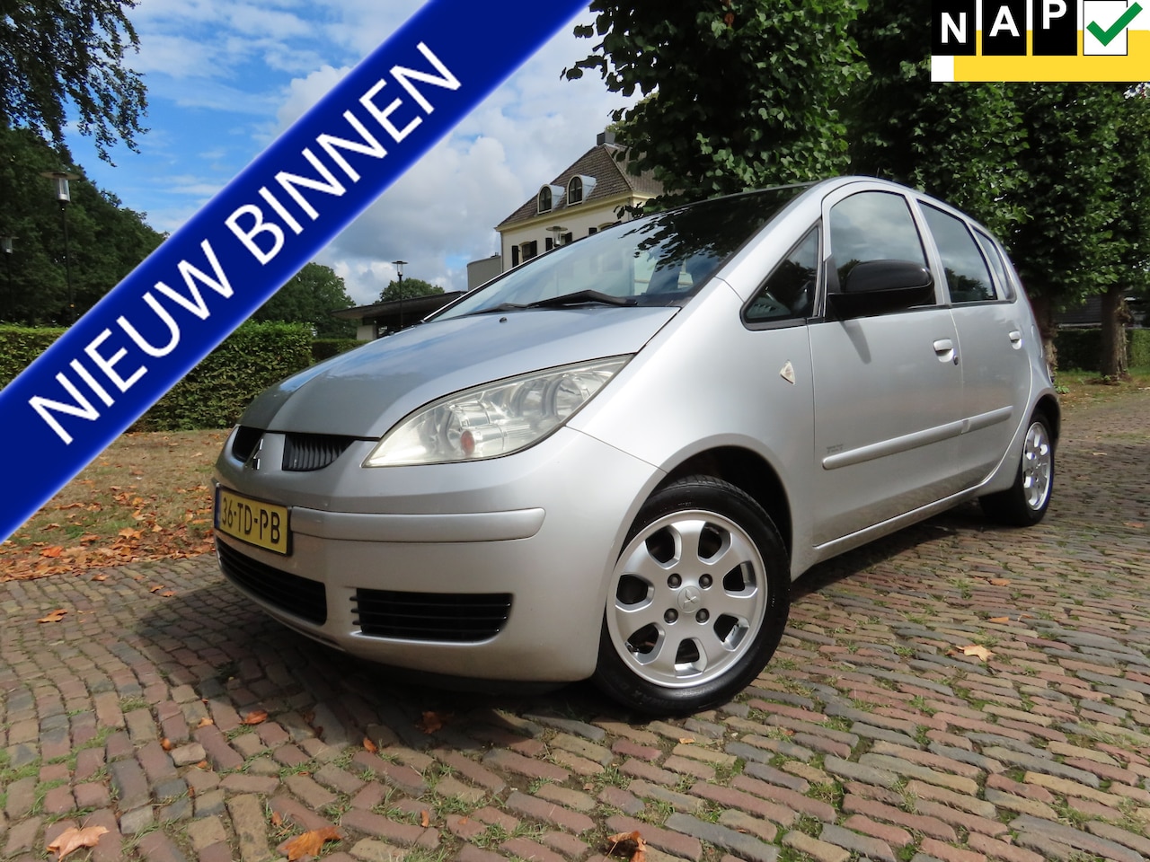 Mitsubishi Colt - 1.3 Invite Automaat Airco 5 Drs Lm Velgen Trekhaak - AutoWereld.nl