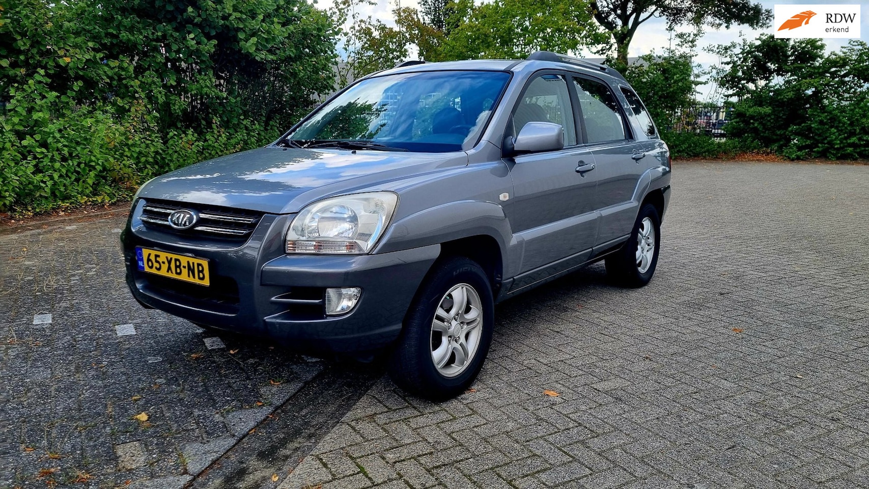 Kia Sportage - 2.0 CVVT X-ecutive 2.0 CVVT X-ecutive - AutoWereld.nl