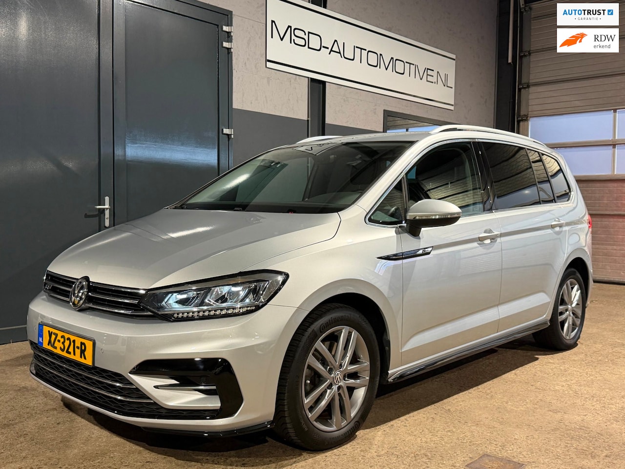 Volkswagen Touran - 1.5 TSI Highline Business R-Line 7 persoons Led NAP - AutoWereld.nl
