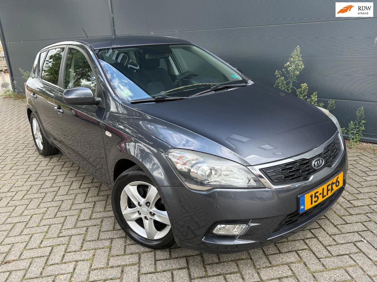 Kia Cee'd - 1.4 CVVT Seven/Navi/Cruise/bleutooth/Airco - AutoWereld.nl