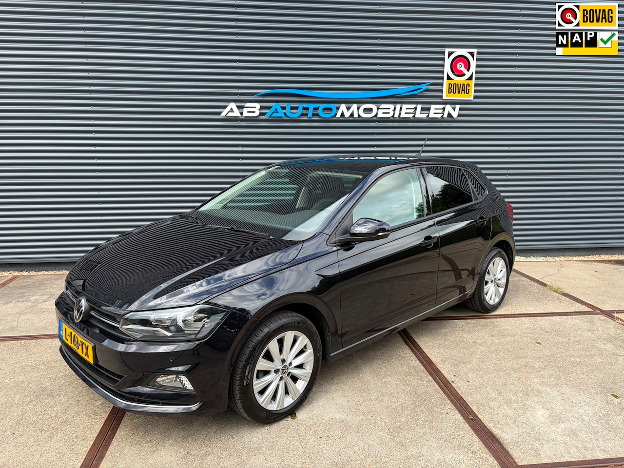 Volkswagen Polo - 1.0 TSI Highline AUTOMAAT/ PDC/ CLIMA - AutoWereld.nl