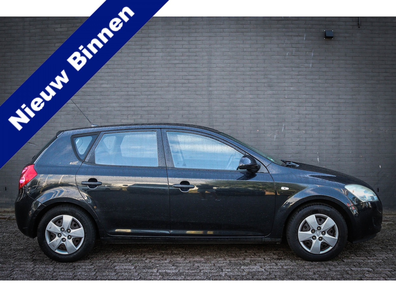 Kia Cee'd - 1.4 X-tra Net binnen-Nu al te bezichtigen - AutoWereld.nl