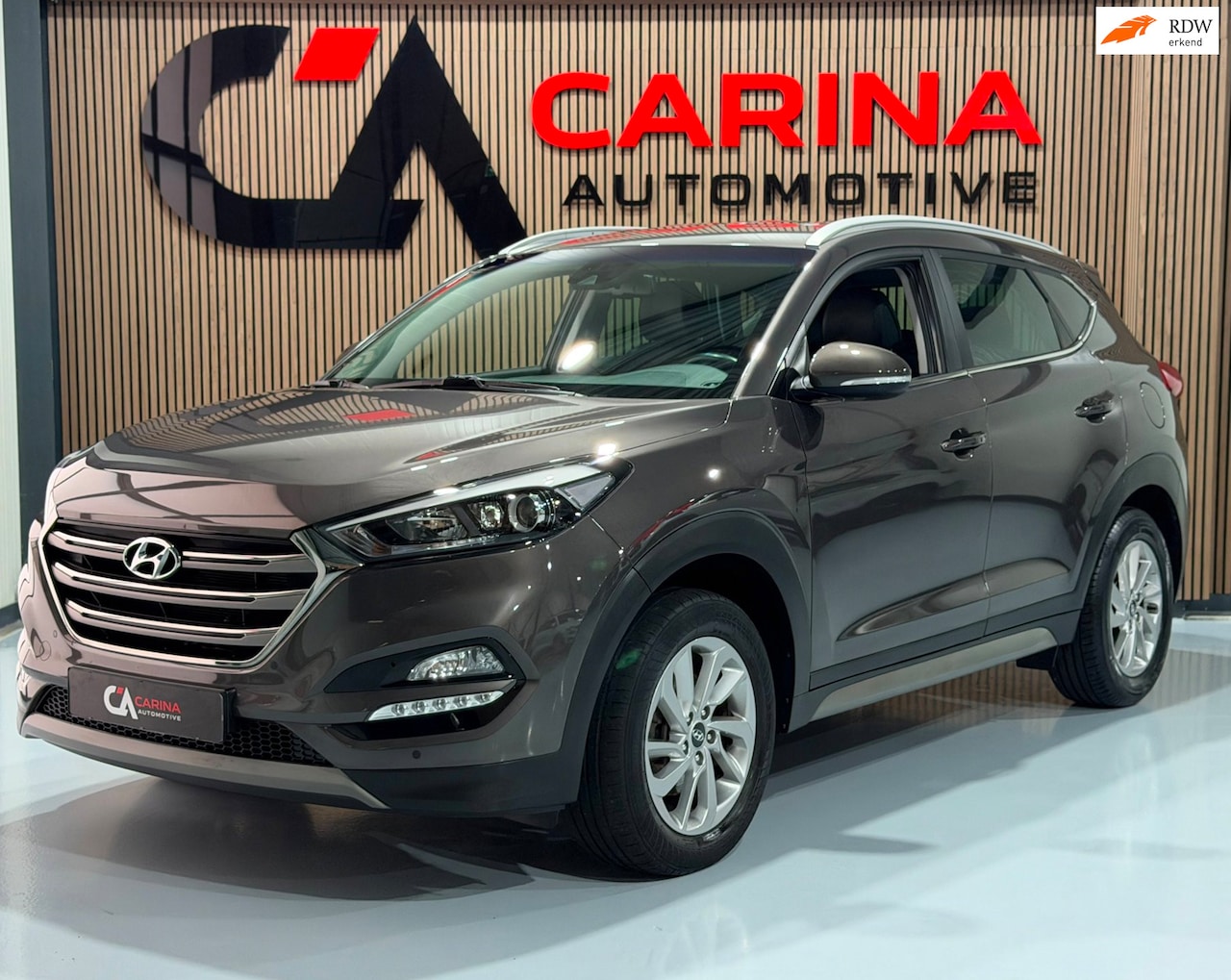 Hyundai Tucson - 1.6 GDi Premium / Lederen Interieur / Keyless / Elektrische Stoelen / Lane Assist / Start - AutoWereld.nl