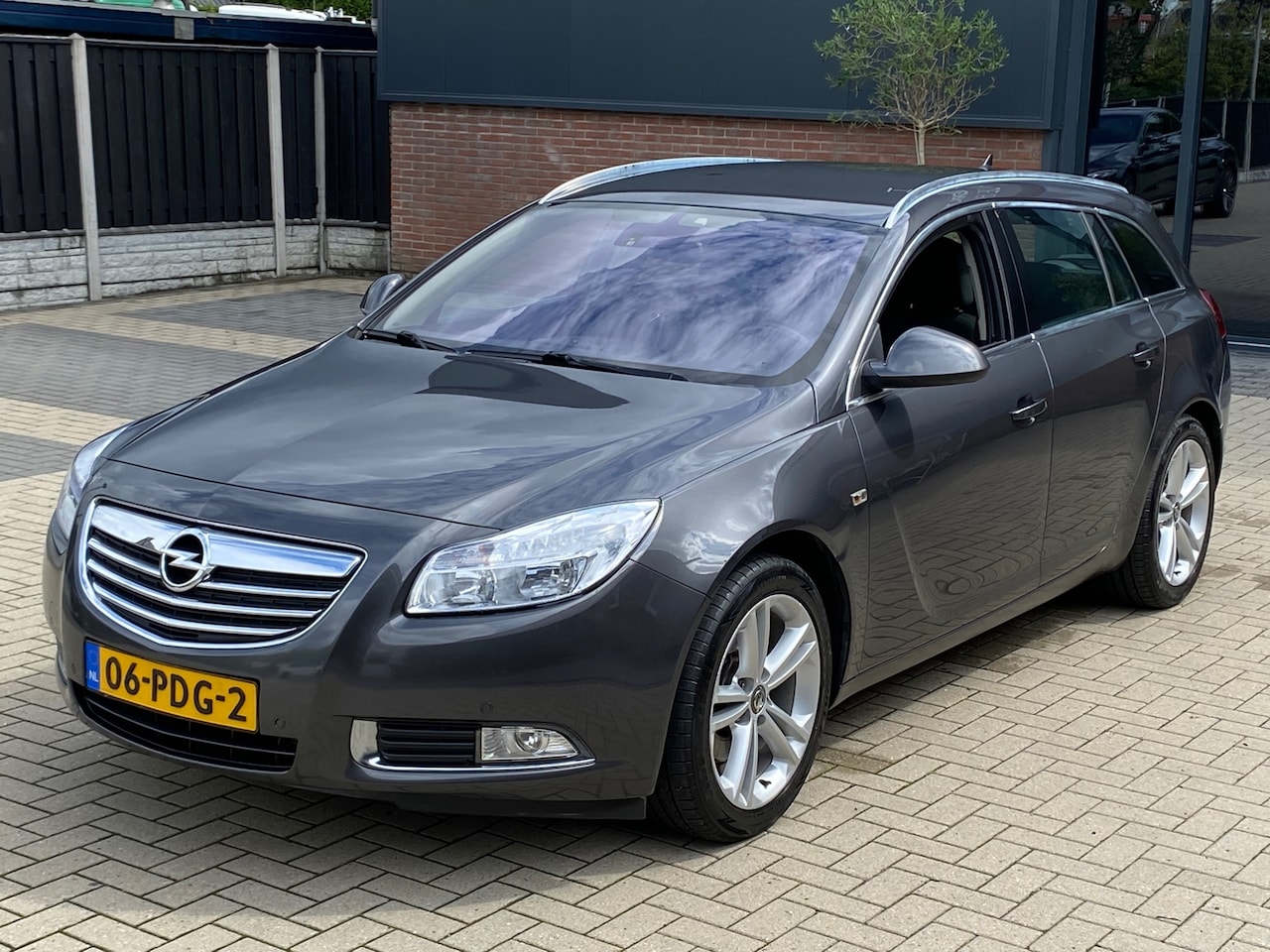 Opel Insignia Sports Tourer - 1.6 T 180 PK NAVI CRUISE CLIMA PDC TREKHAAK L.M. VELGEN ELEKTR PAKKET - AutoWereld.nl