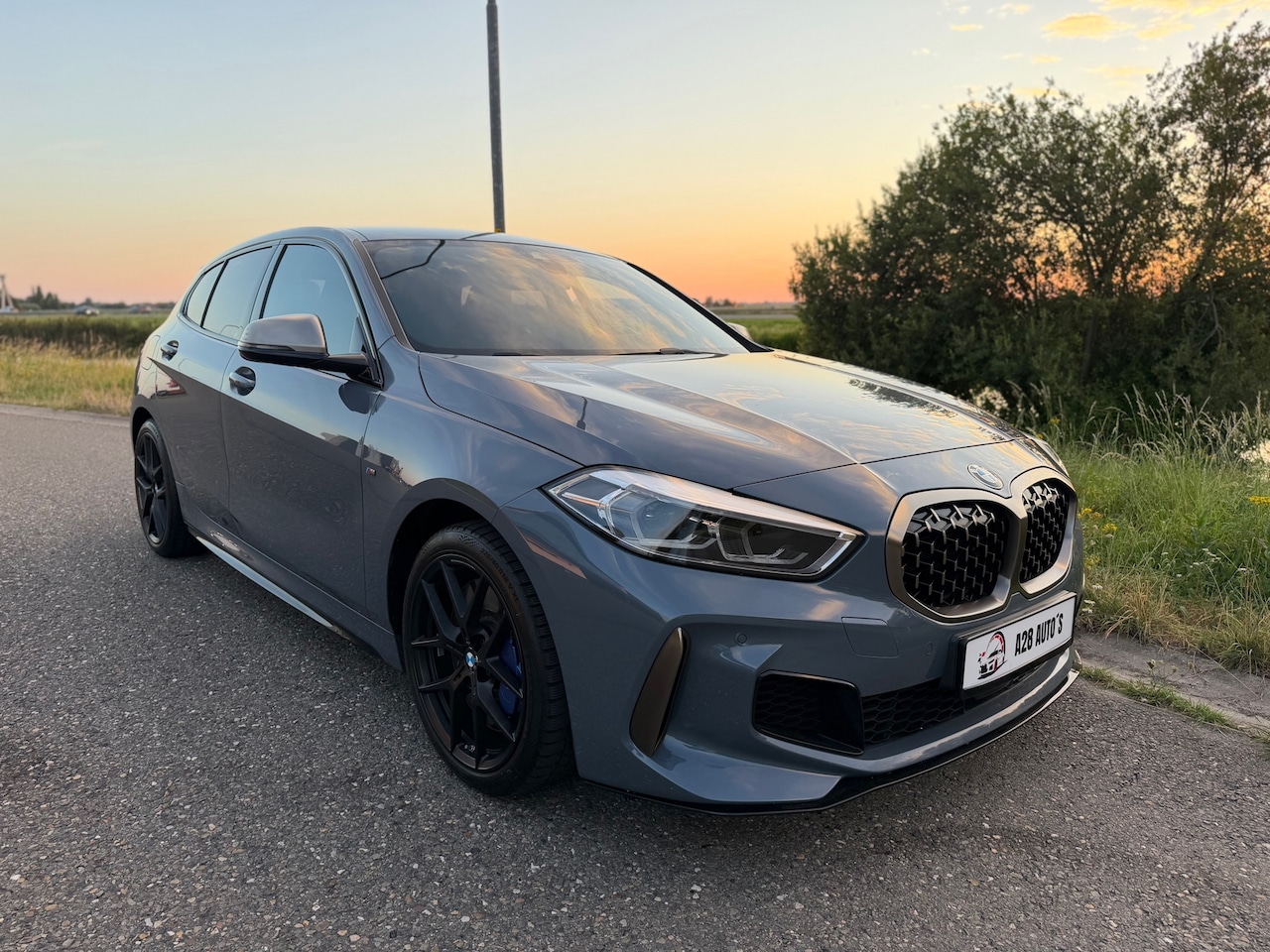 BMW 1-serie - M135i xDrive High Executive Edition|Automaat|Cruise Contr|Stoelverw - AutoWereld.nl