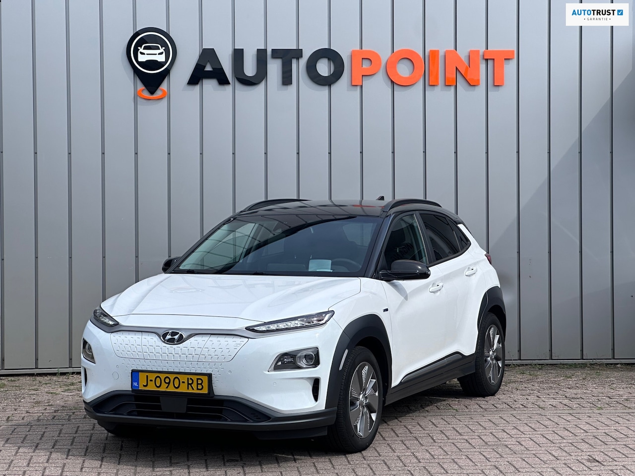 Hyundai Kona Electric - EV Premium 64 kWh SOH100% WARMTEPOMP|TREKHAAK|HEADUP|STOEL&STUURVRM+VERKOELING|LEDER|BLIND - AutoWereld.nl