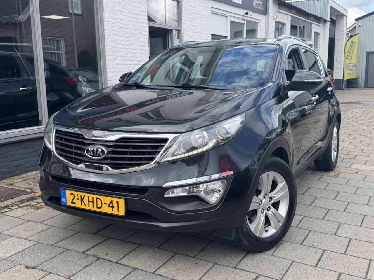 Kia Sportage - 1.6 GDI Plus Pack*Navi*Tr-haak*Camera*Dealer-ond.* - AutoWereld.nl