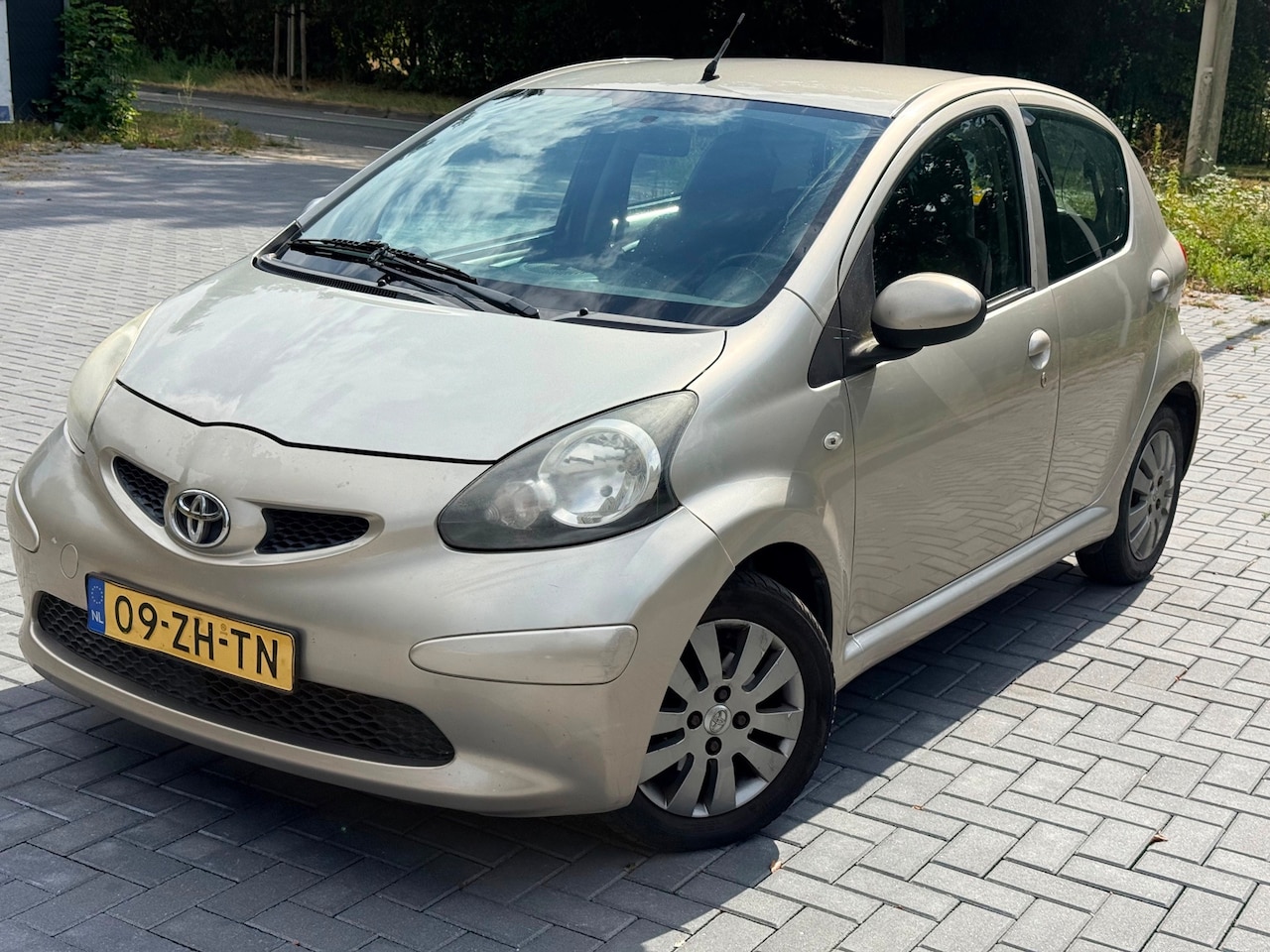 Toyota Aygo - 1.0-12V +/Airco/Leer/Elekt Raam/LMV/NAP - AutoWereld.nl