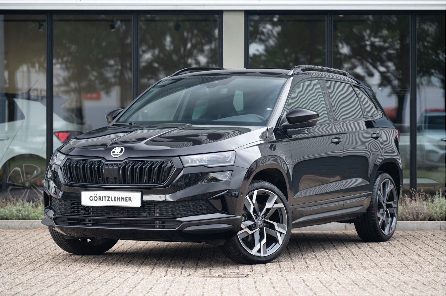 Skoda Karoq - 1.5 TSI ACT Sportline | Trekhaak | 360cam | CANTON | Matrix LED - AutoWereld.nl