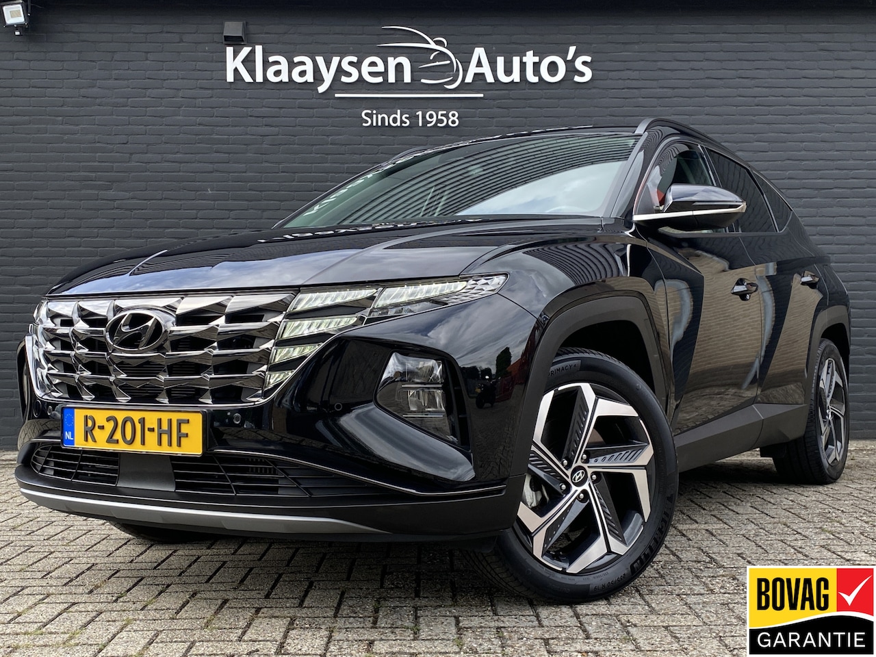 Hyundai Tucson - 1.6 T-GDI PHEV 265 pk Comfort Smart 4WD | 1e eigenaar | navigatie | elektr. a. klep | adap - AutoWereld.nl