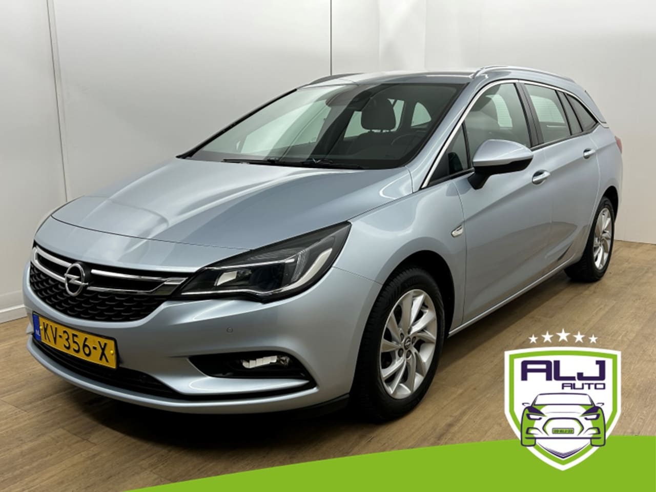 Opel Astra Sports Tourer - Occasion 1.4 Innovation | Grijs | Tweedehands Opel Astra | Airco | Cruise | Trekhaak | Blu - AutoWereld.nl
