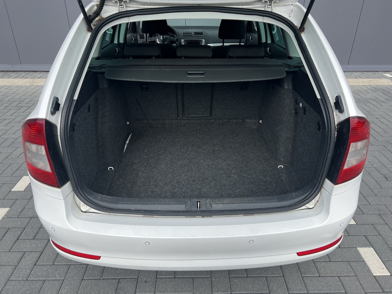 Skoda Octavia Combi - 1.2 TSI Elegance Business Line | Nieuw binnen | Cruise | Navi - AutoWereld.nl
