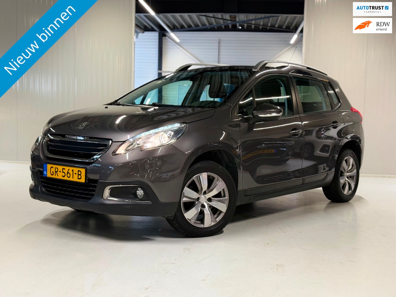 Peugeot 2008 - 1.2 82PK Active Automaat|Navigatie|Panoramadak!! - AutoWereld.nl
