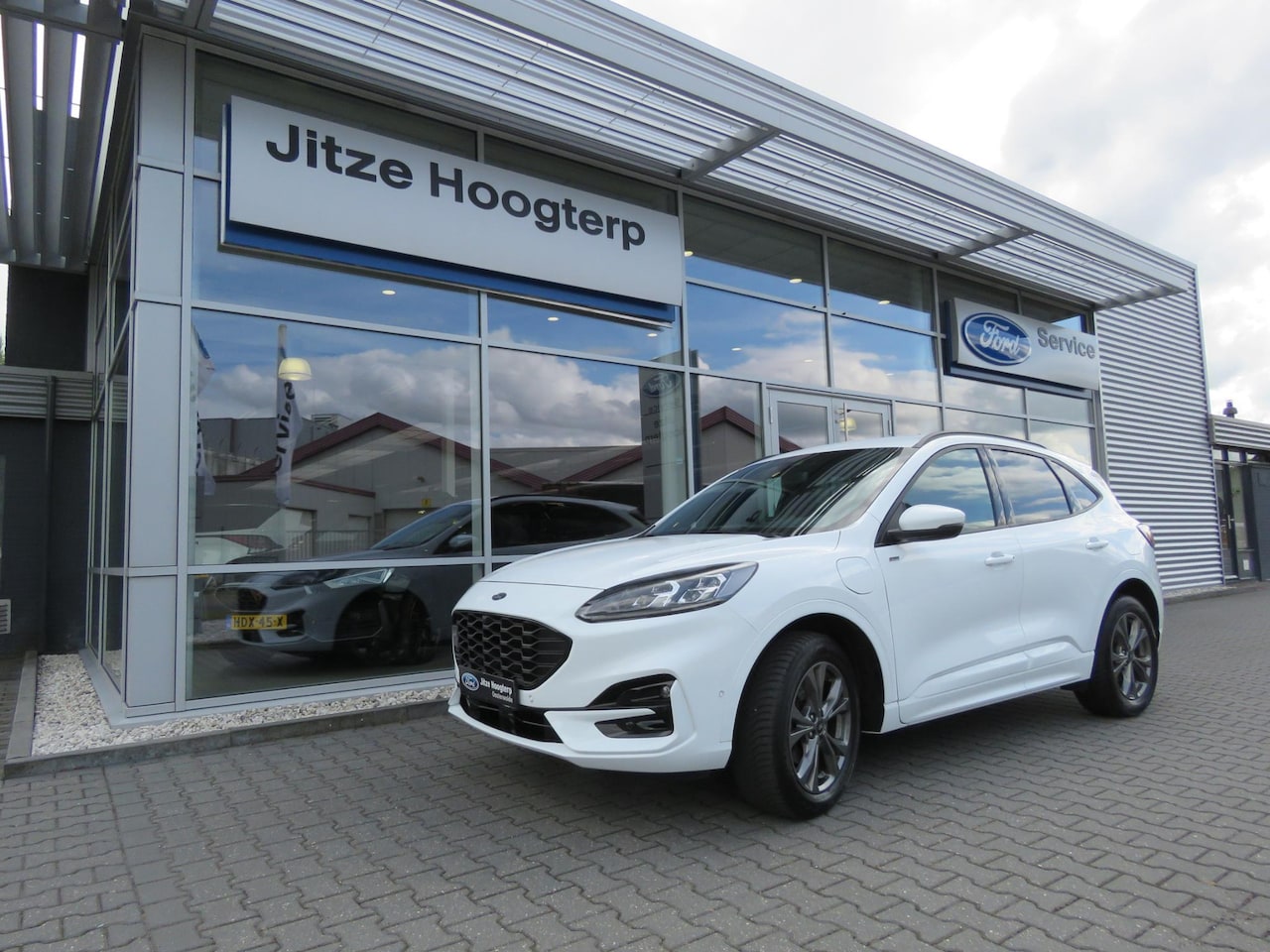 Ford Kuga - 2.5 Duratec PHEV ST-Line X NAVI,ADAPTIVE CRUISE,WINTER PACK,BLISS,ELEKTR A KLEP,ELEKTR VER - AutoWereld.nl