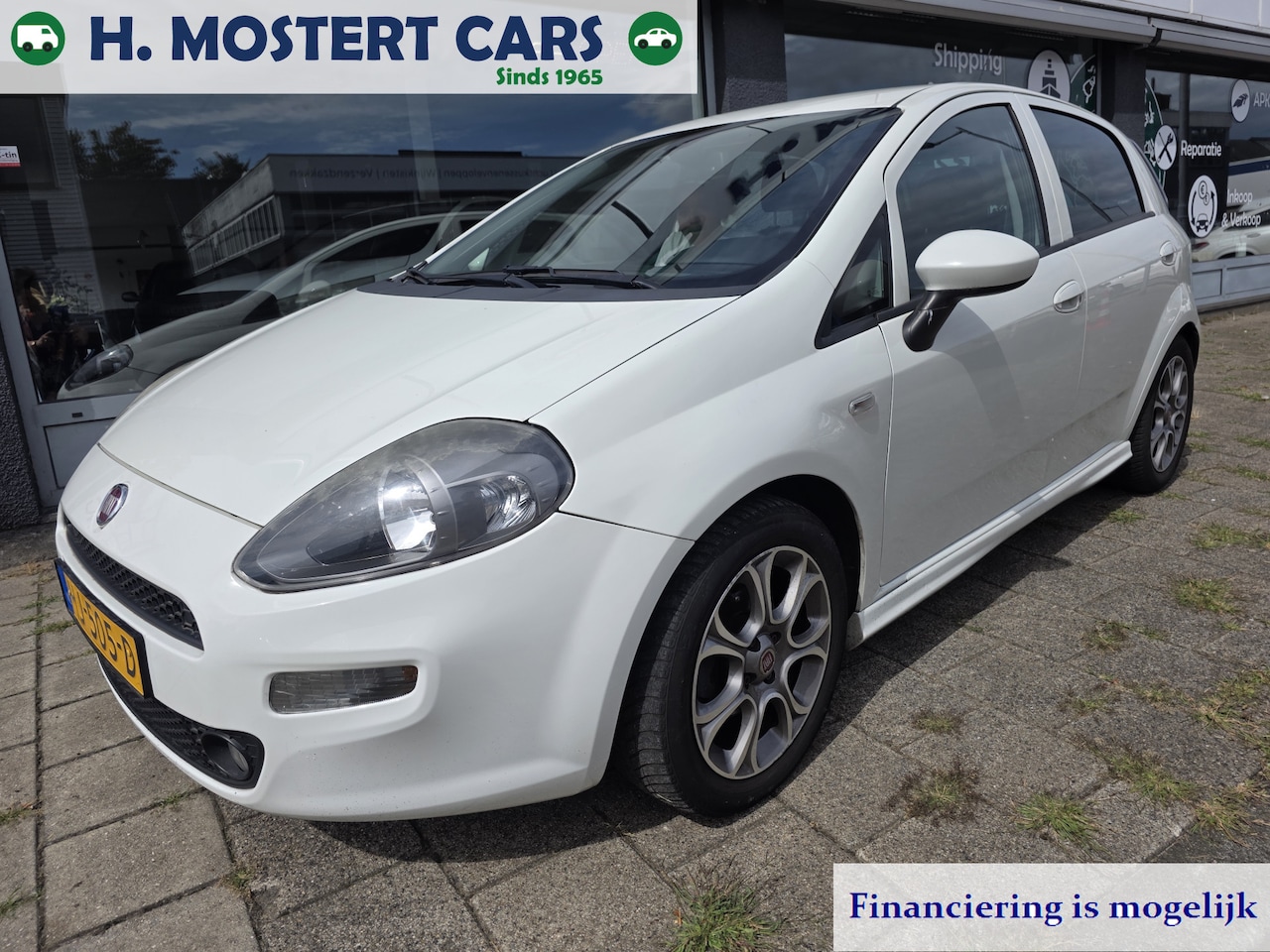 Fiat Punto Evo - 1.3 M-Jet Lounge Bj. 2015  *Airco* Nette GOED rijdende auto - AutoWereld.nl