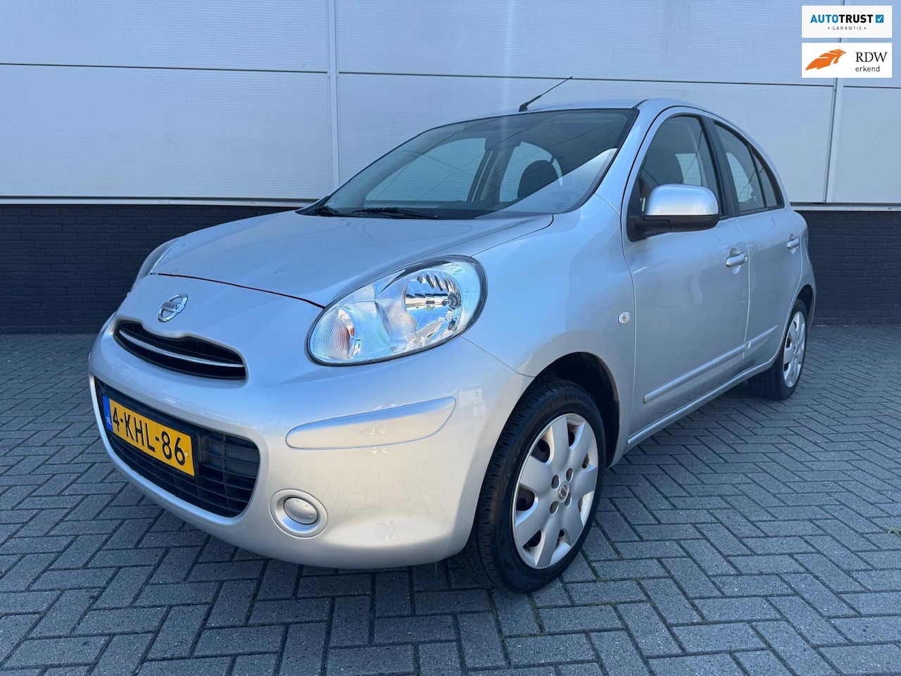 Nissan Micra - 1.2 Acenta 5drs clima - cruise control - isofix - bluetooth - all season - aux - goed onde - AutoWereld.nl