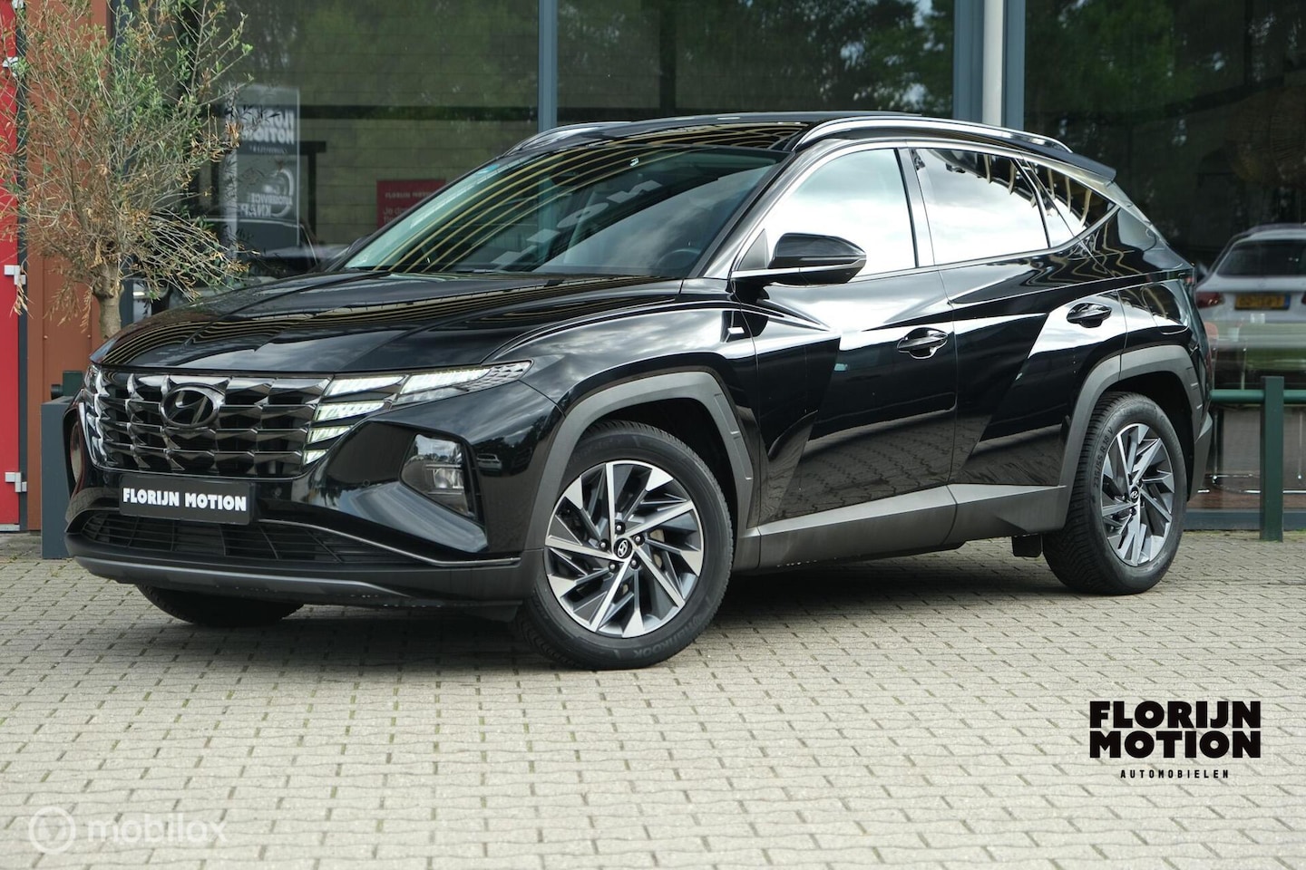 Hyundai Tucson - 1.6 T-GDI MHEV Comfort Smart | Pano | Stoelverwarming | Trekhaak | 18 Inch | Carplay | LED - AutoWereld.nl