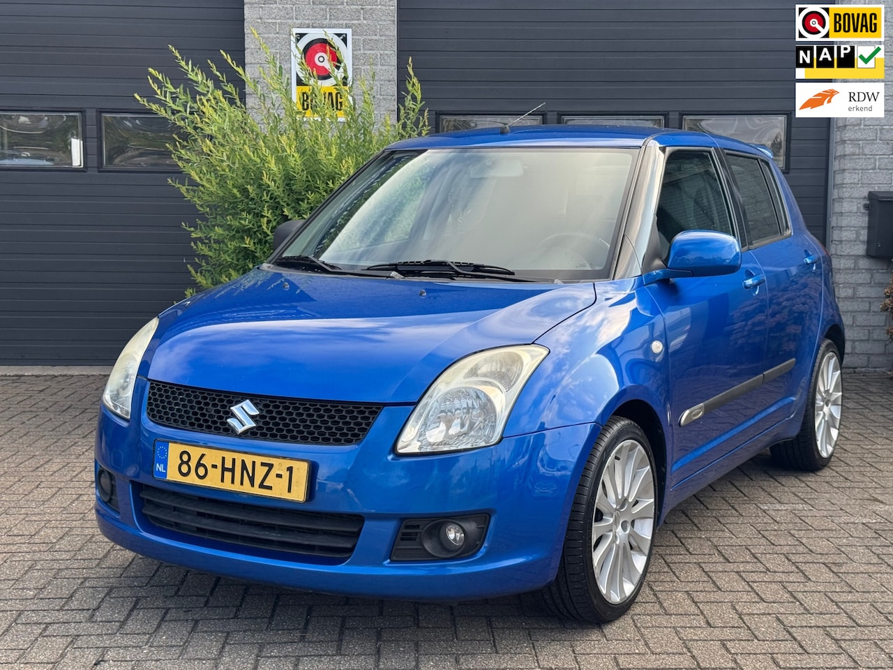 Suzuki Swift - 1.3 Bandit *Lichtmetalen velgen*Airco* - AutoWereld.nl