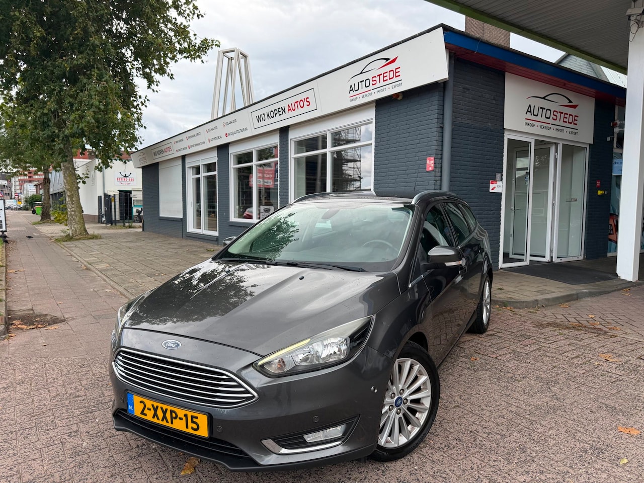 Ford Focus Wagon - 1.0 First Edition|NW DISTRIBUTIE|NAVI|CRUISE|PSENSOR|TREKHAAK|BOEKJES - AutoWereld.nl
