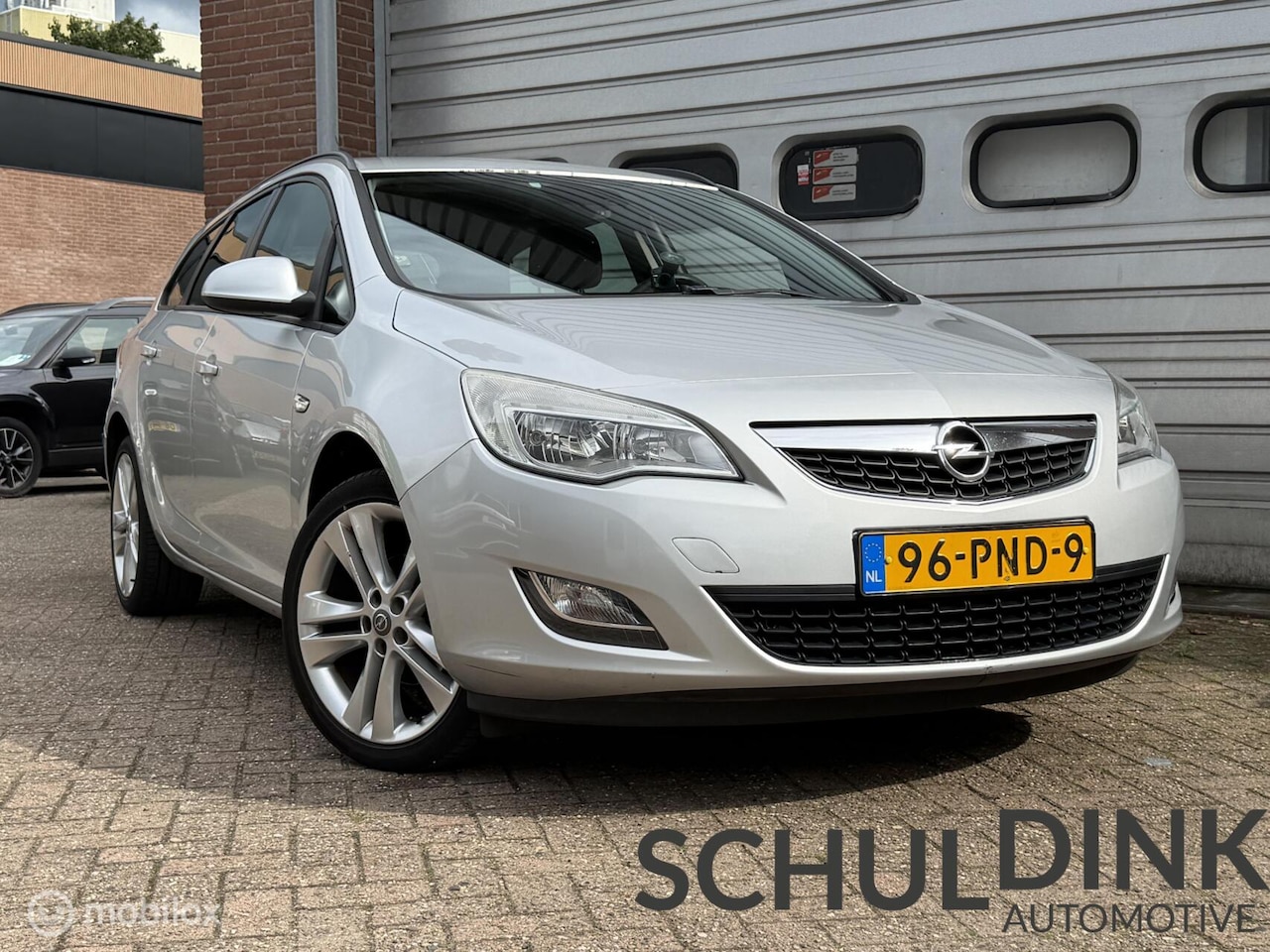 Opel Astra Sports Tourer - 1.4 Edition CRUISE CONTROLE|AIRCO - AutoWereld.nl