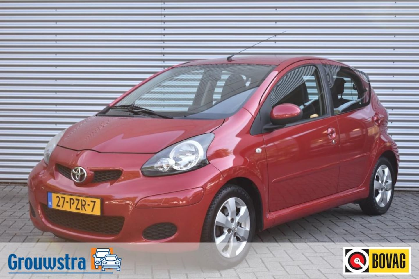 Toyota Aygo - 1.0-12V ASPIRATION RED NAVIGATOR / AIRCO / LMV / 4-SEASON BANDEN / - AutoWereld.nl