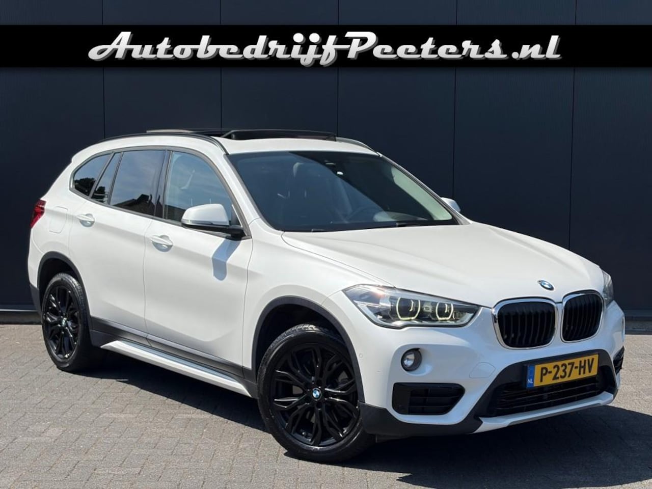 BMW X1 - sDrive20i Aut. Sport Line Pano LED HUD Navi+ Cruise PDC 18inch - AutoWereld.nl