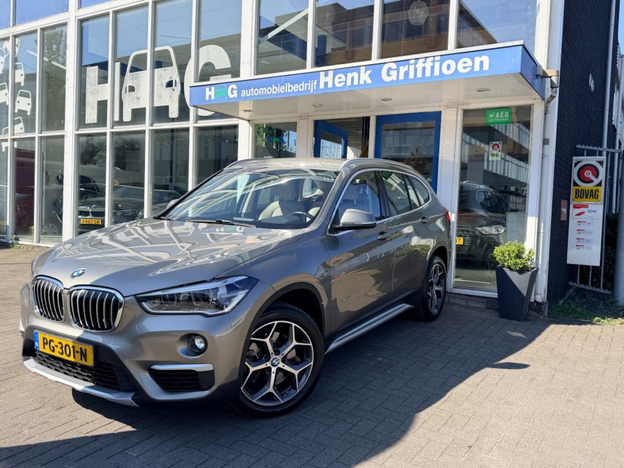 BMW X1 - X1 sDrive20i High Executive I Leer I Camera I Trekhaak - AutoWereld.nl