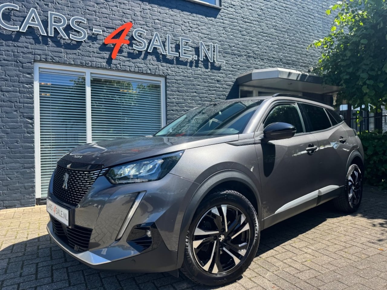Peugeot 2008 - 1.2 Allure 130 pk + Camera + Led + 1/2 leder + 17 inch Lmv -2022 - AutoWereld.nl