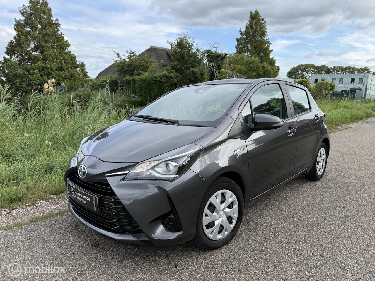 Toyota Yaris - 1.5 Hybrid Dynamic / Invalide Auto / Cam / Navi - AutoWereld.nl