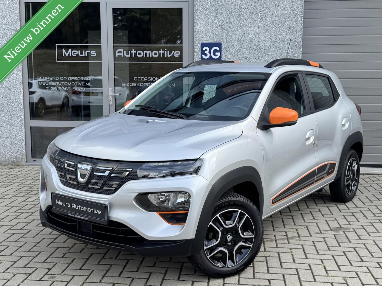 Dacia Spring - Comfort Plus (Orange Pack) SOH 93% 27 kWh/Navi/Camera/CarPlay - AutoWereld.nl
