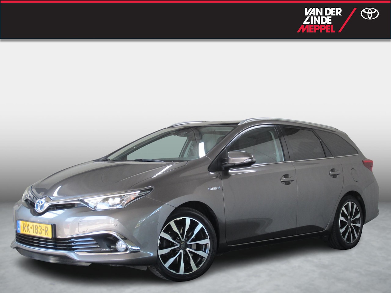 Toyota Auris Touring Sports - 1.8 Hybrid Executive Trekhaak Panoramadak - AutoWereld.nl