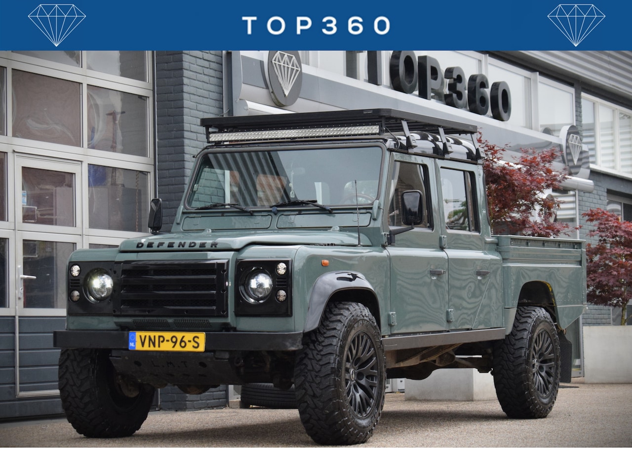 Land Rover Defender 130 - 2.5 Td5 SW 130" SE Keswick Green | Sawtooth | Ledbar | Roofrack - AutoWereld.nl