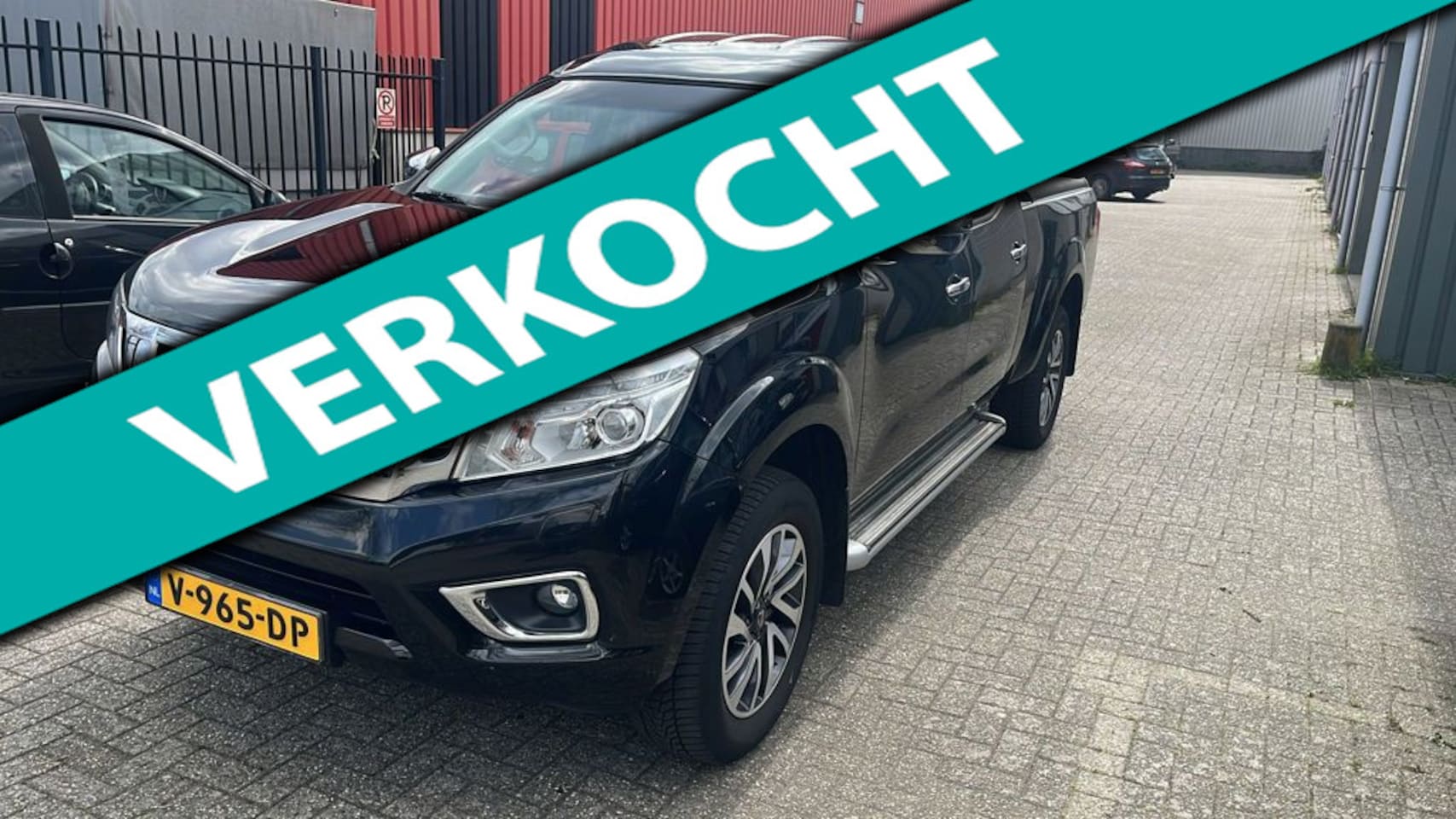 Nissan Navara - 2.3 dCi Tekna Double Cab 1e eigenaar - AutoWereld.nl